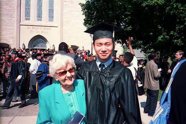 George college graduation photo 1 with grandma Garber