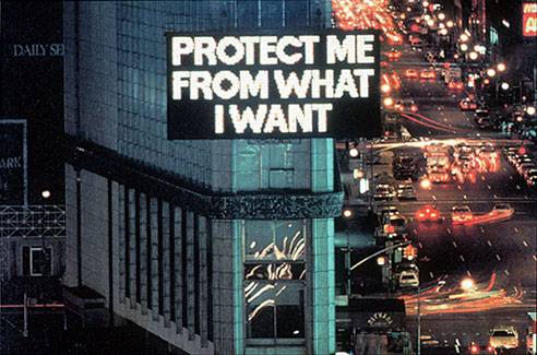 Jenny Holzer, Protect Me from What I Want.  NOTE:  The work you saw in class appeared in Las Vegas.  Holzer's work has appeared elsewhere, in New York as in this picture, or even on the hoods of the world's mos
t expensive race cars.