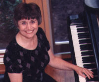 Linda at 
her Steinway