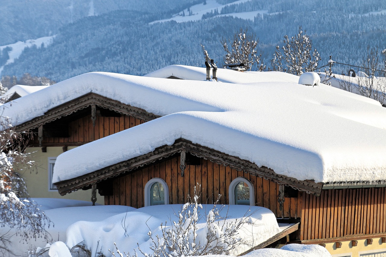 Skittles houses with snowy roofs