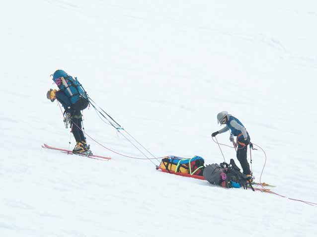 person pulling sled